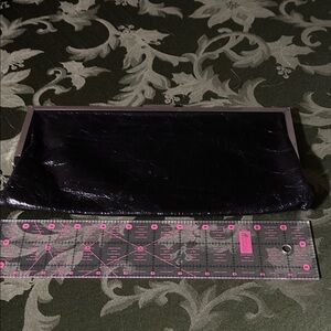 HOBO Shiny Black Leather Clutch